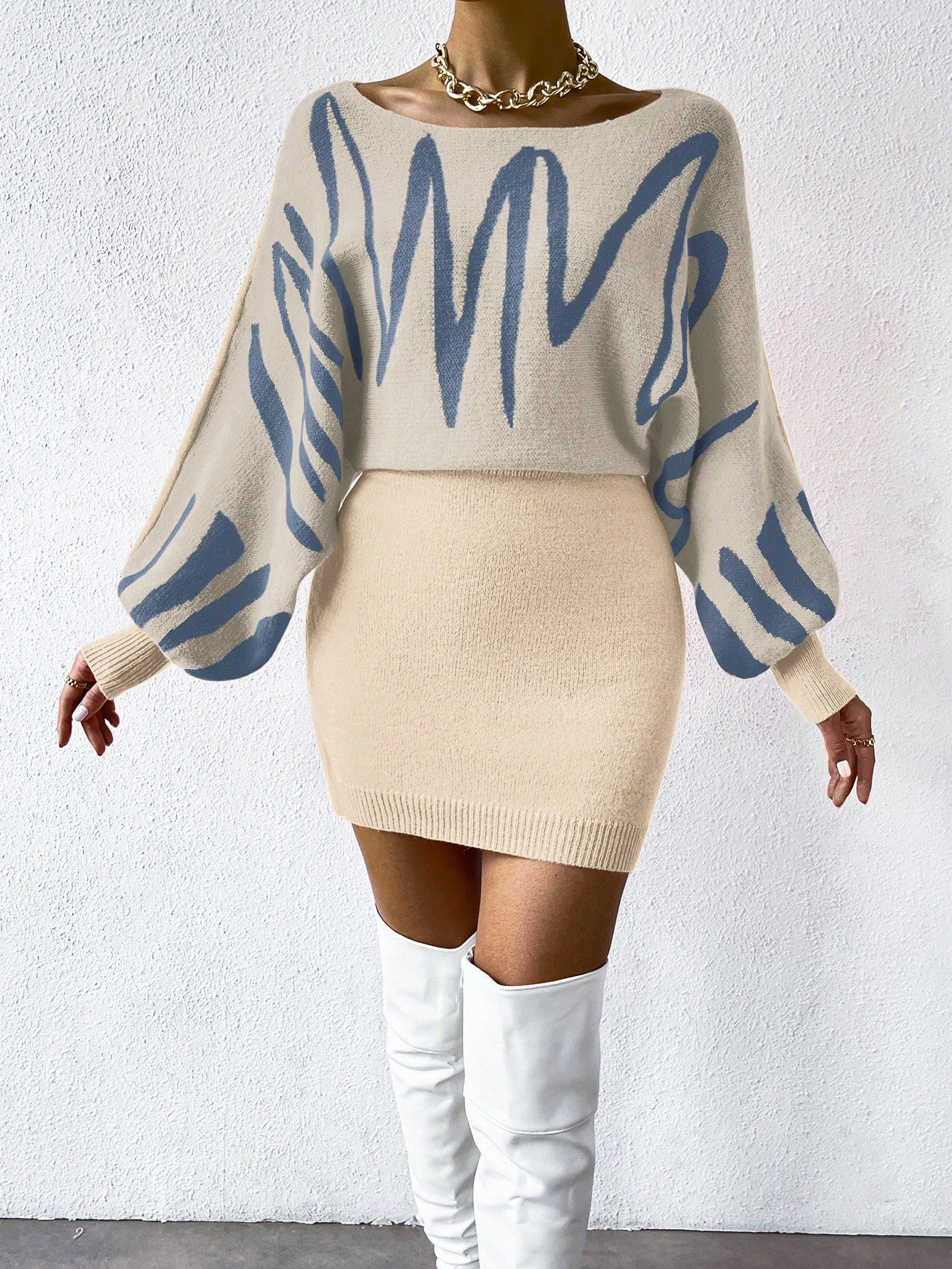 Professional rewrite: ```SHEIN Privé Batwing Sleeve Sweater Dress with Graphic Pattern```